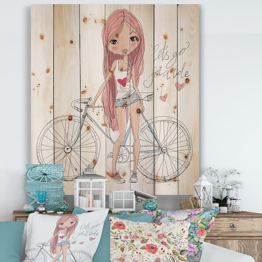 Designart - Young Girl With Bicycle - Children's Art Print on Natural Pine Wood